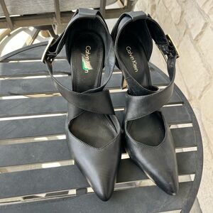 Calvin Klein Black Pointed Toe Cross-Strap Pumps with Gold Buckle